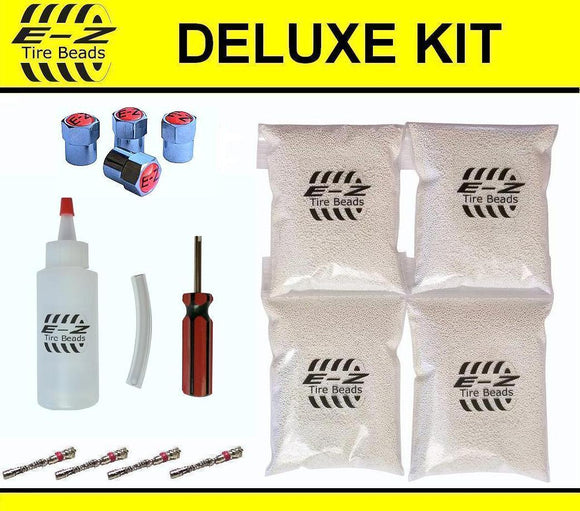 E-Z Tire Beads Deluxe Balance Kit 10 oz Four-Pack (4 bags of 10 oz Balancing Beads) 40 Ounces Total, Applicator Kit, Filtered Valve Cores, Chrome Caps, No Lead, No Damage, DIY Tire Balance